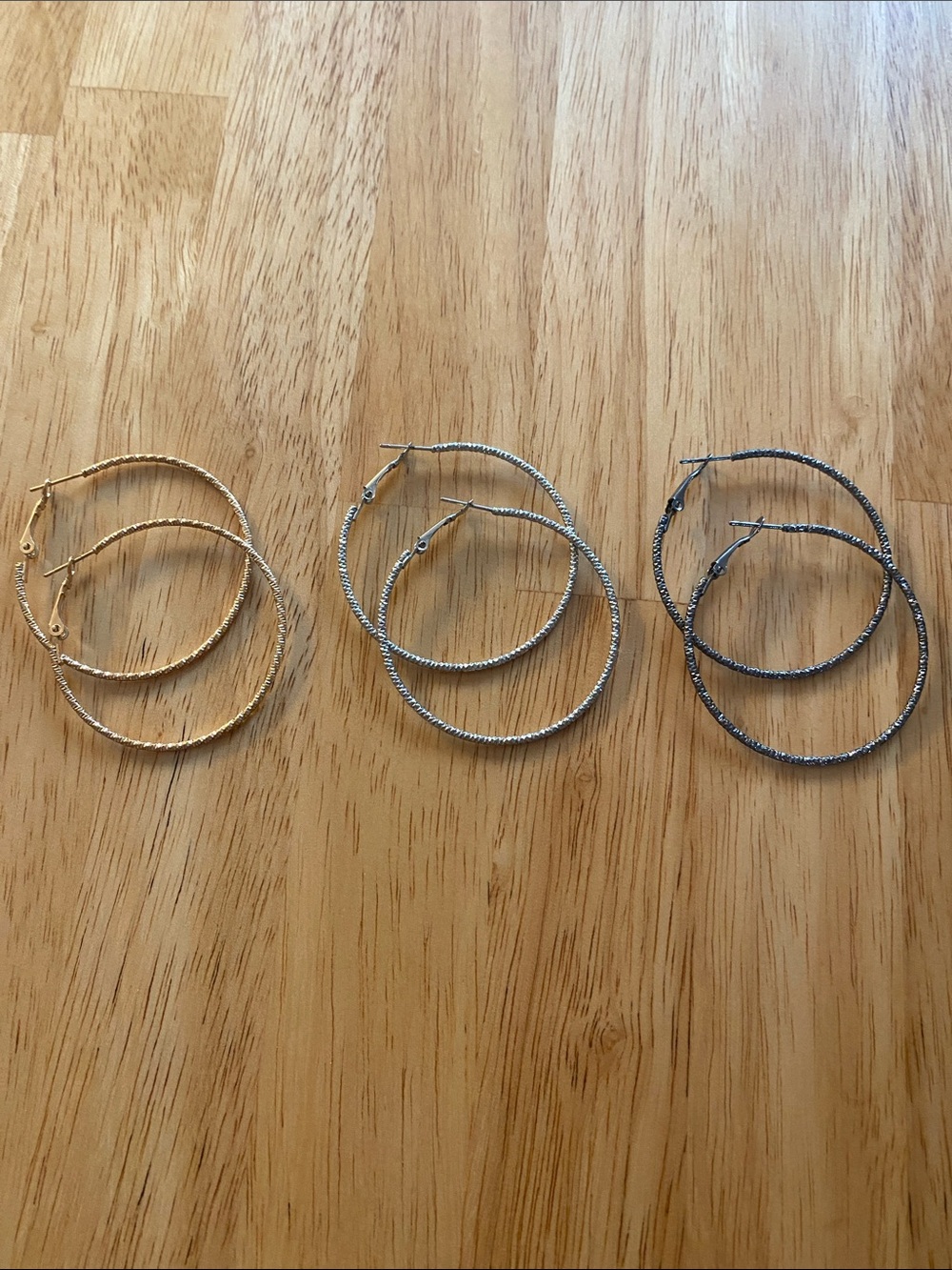 Lot of 3 Gold, Silver, and Dark Gray Textured Hoop Earrings 2” Diameter Hoops